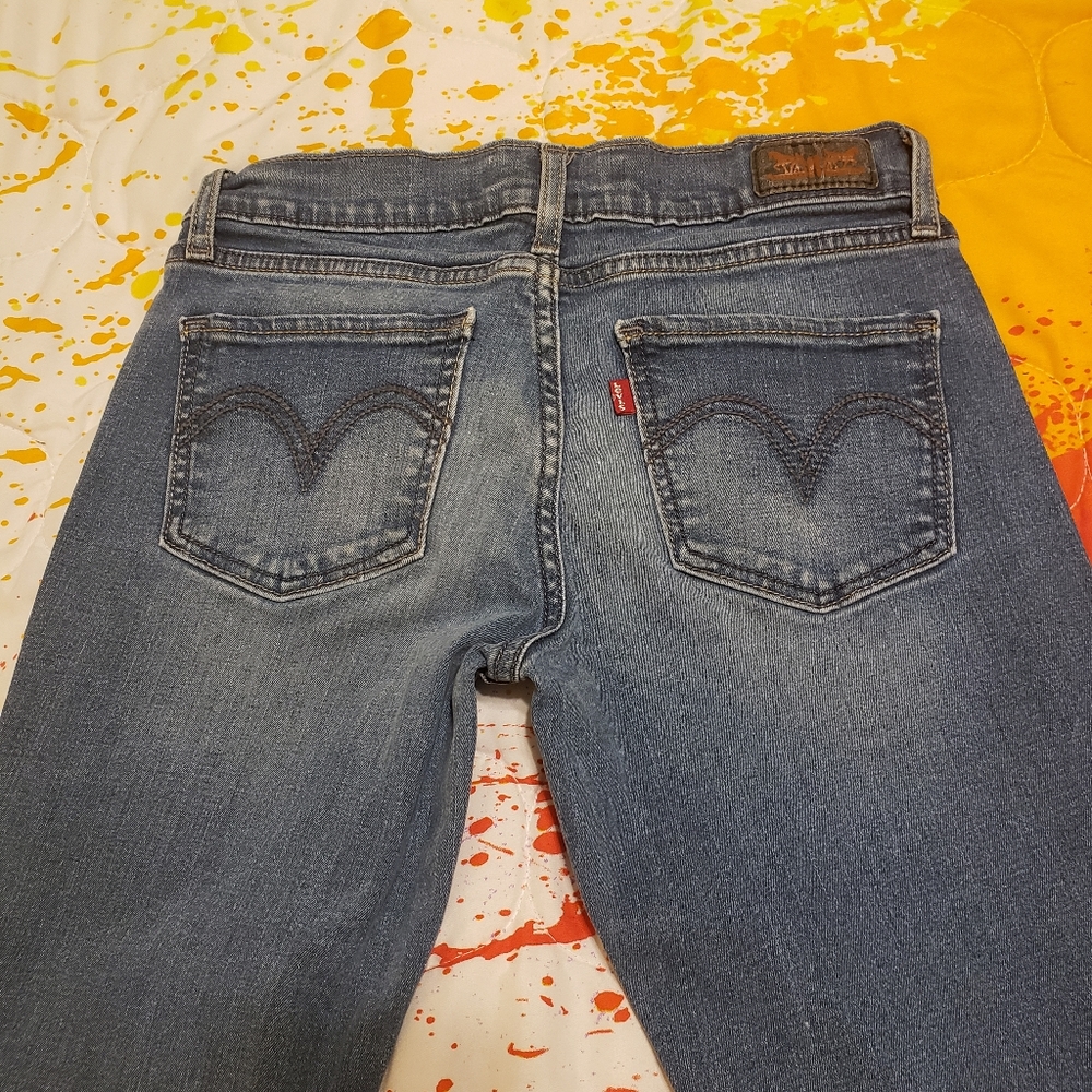 Womens Levi's 524, Super low, 5M / 27. Made in Indonesia. 98% Cotton 2% Elastine